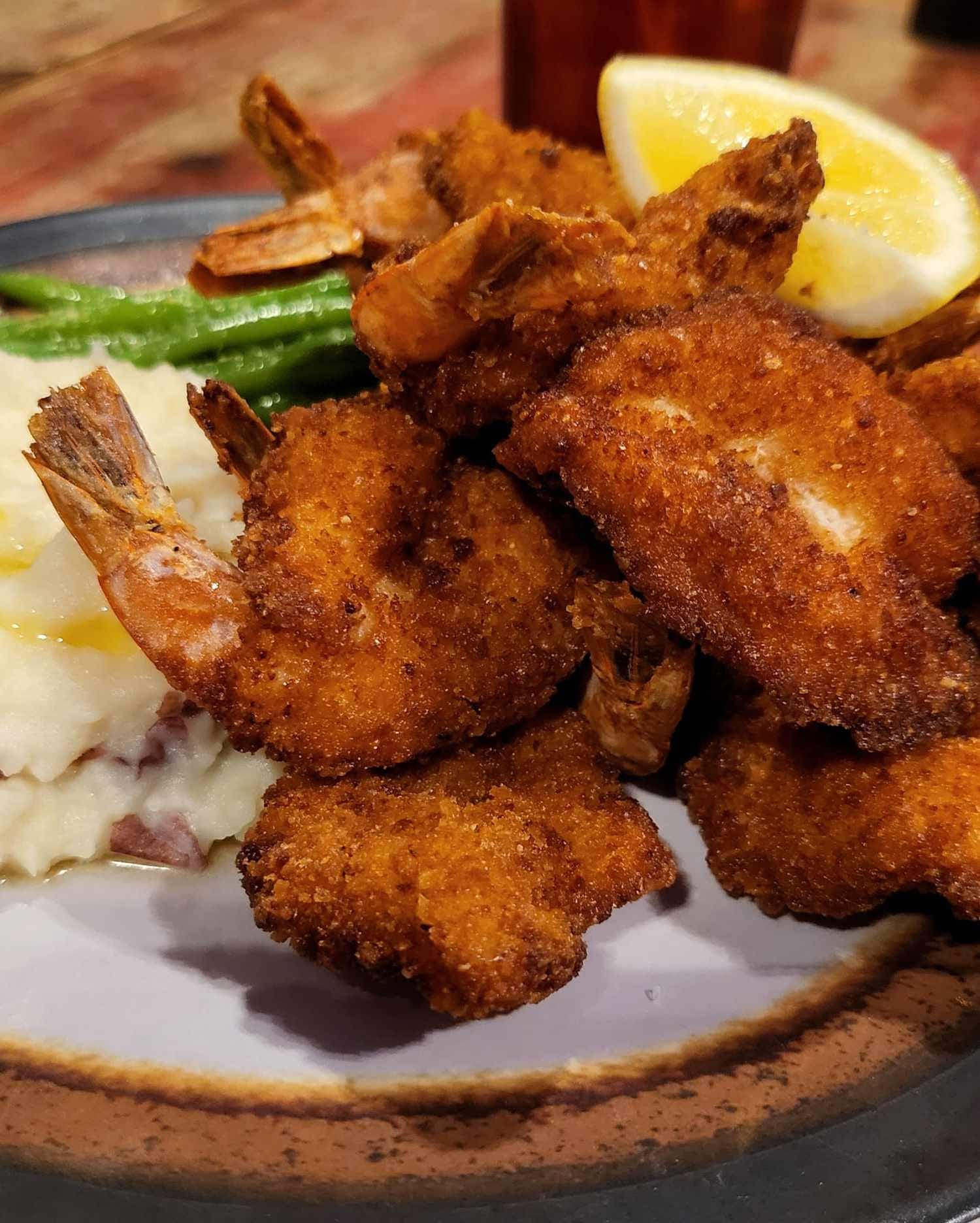 Fried shrimp with mashed potatoes and green beans
